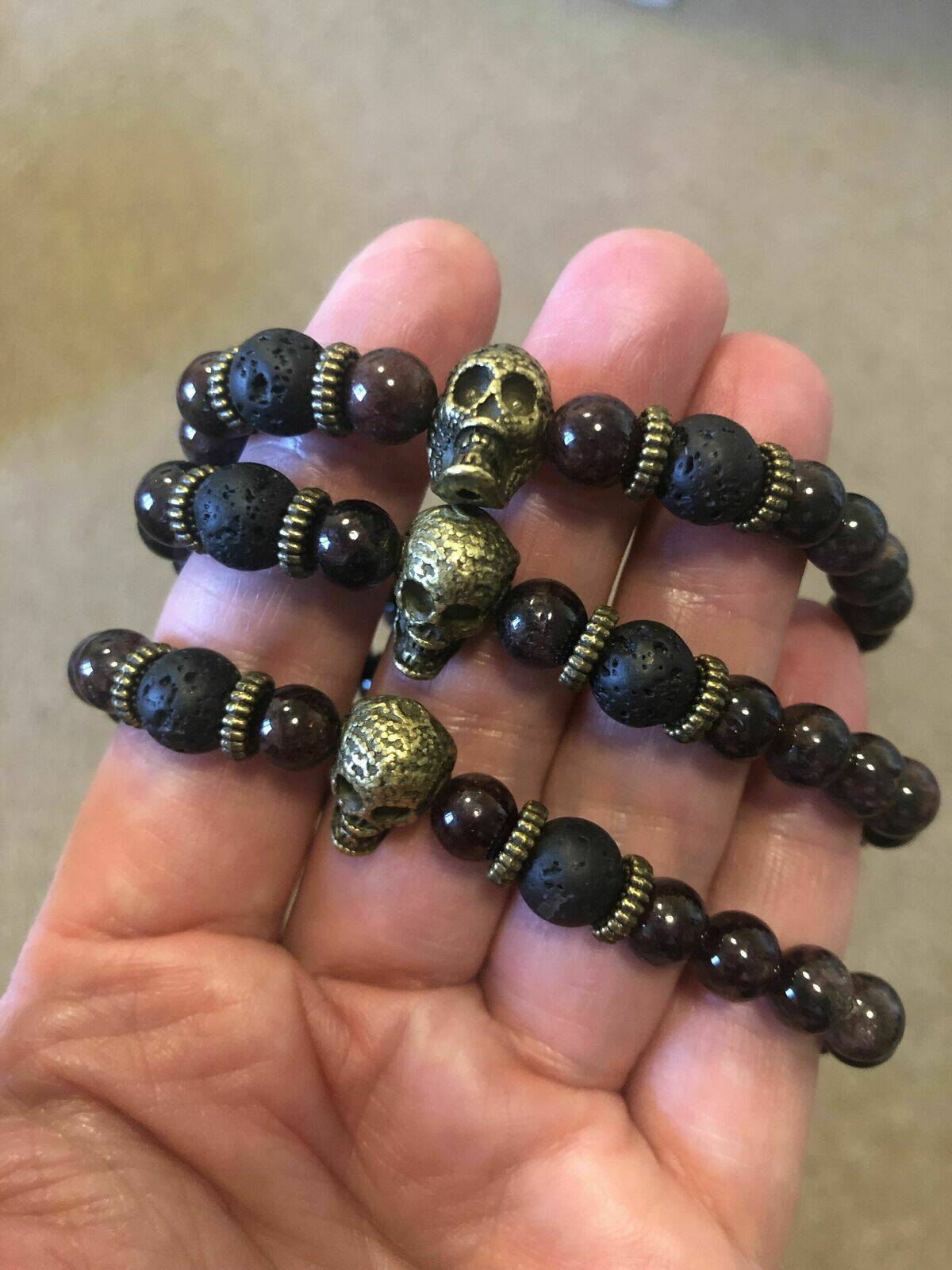 Bloodstone/lava bead bracelets with skull