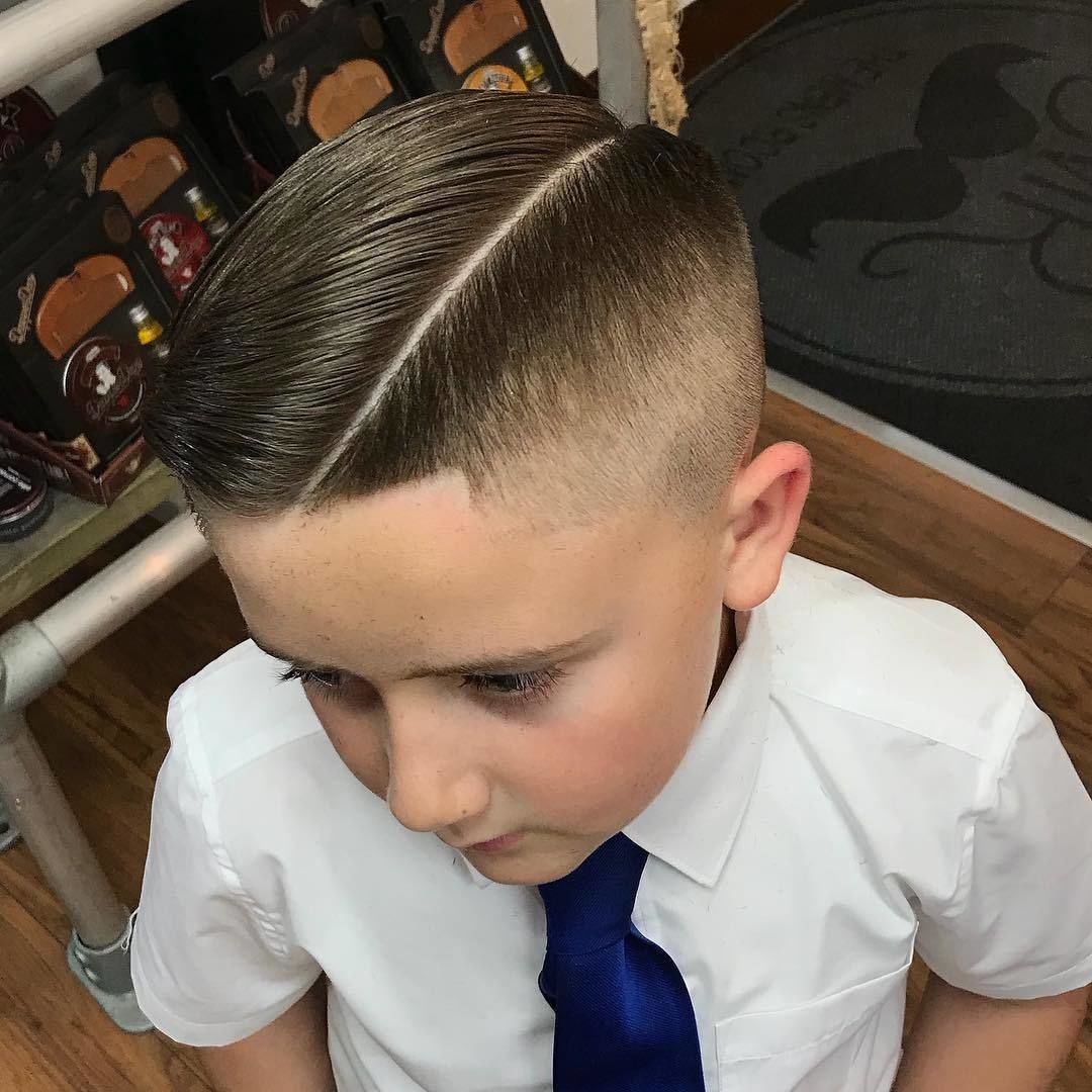 Another cool kid  0.5 fade @hairbyhatto 🦅🦅

• 
•
•
#coolkids #boyshaircut #barbershop #barber #barbershopconnect #hairstyle #health #fitness #hardpart #fade #andis #wahl