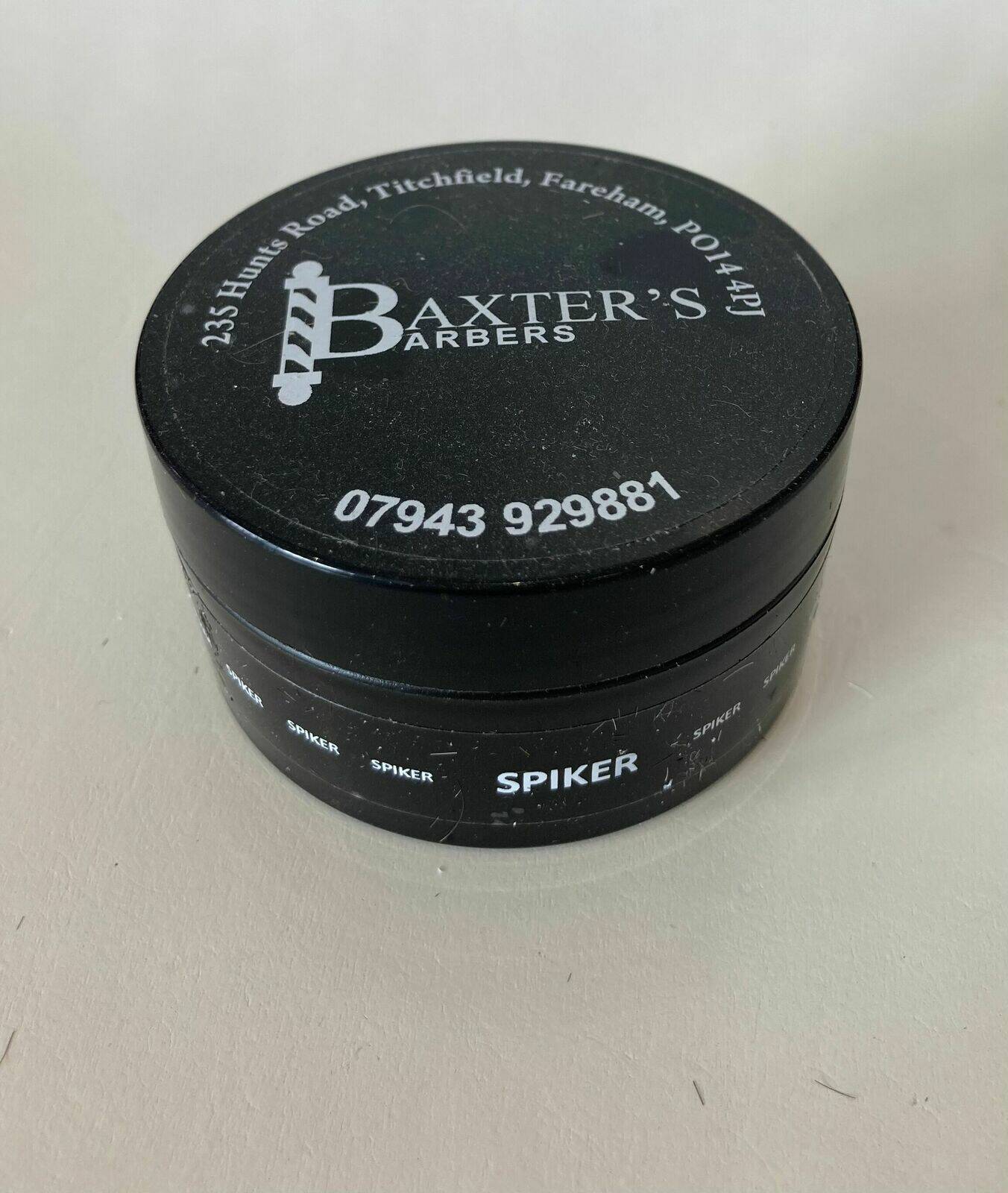 Spiker firm hold wax