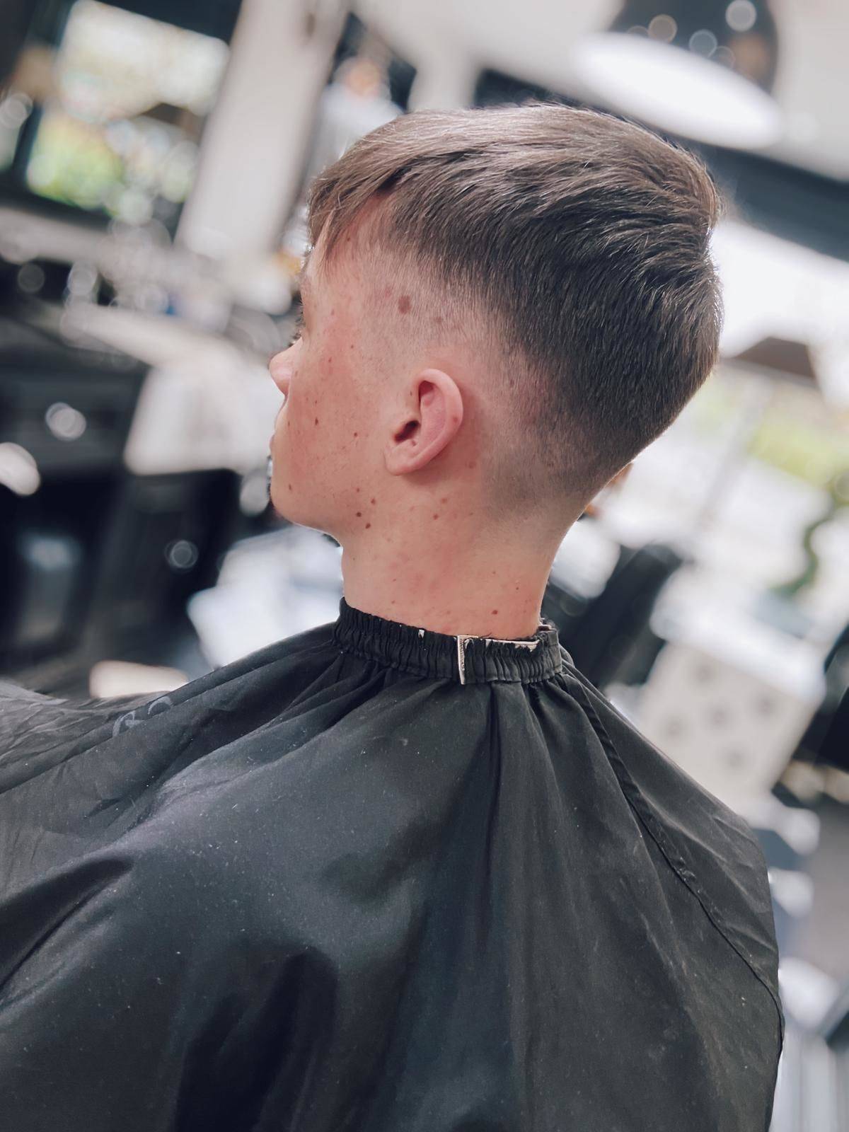 Classic Skin Fade from Barber Jake. Smooth transition to the top for that crisp finish