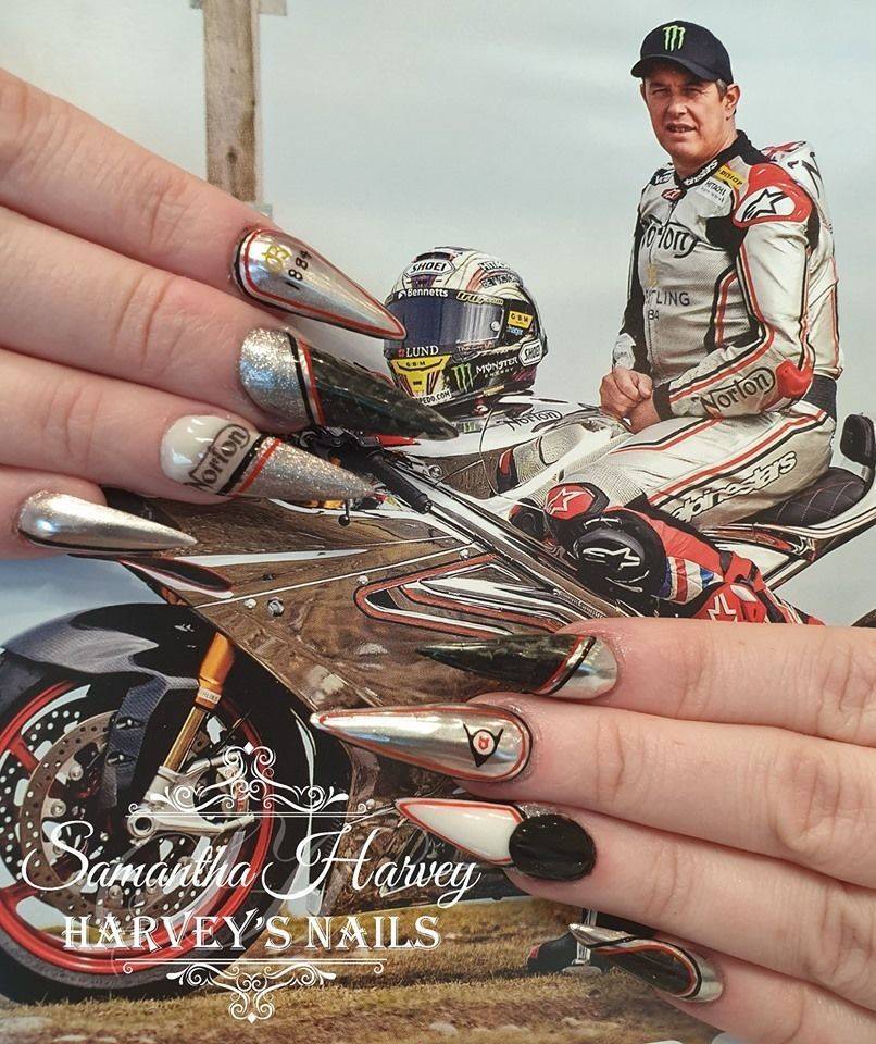 This extreme nail design was created by Sam on her own nails, supporting the Norton Team TT 2019. Chrome and real Carbon Fibre!