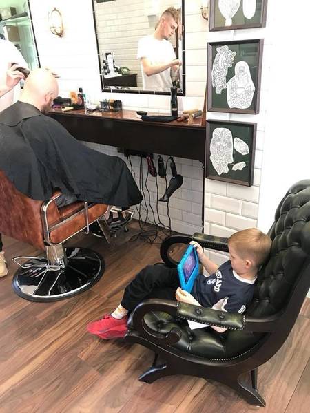 My haircut is all done!  I'll just hang out here while Daddy gets his head shaved by Jamie ‍#familyfriendlybarbershop