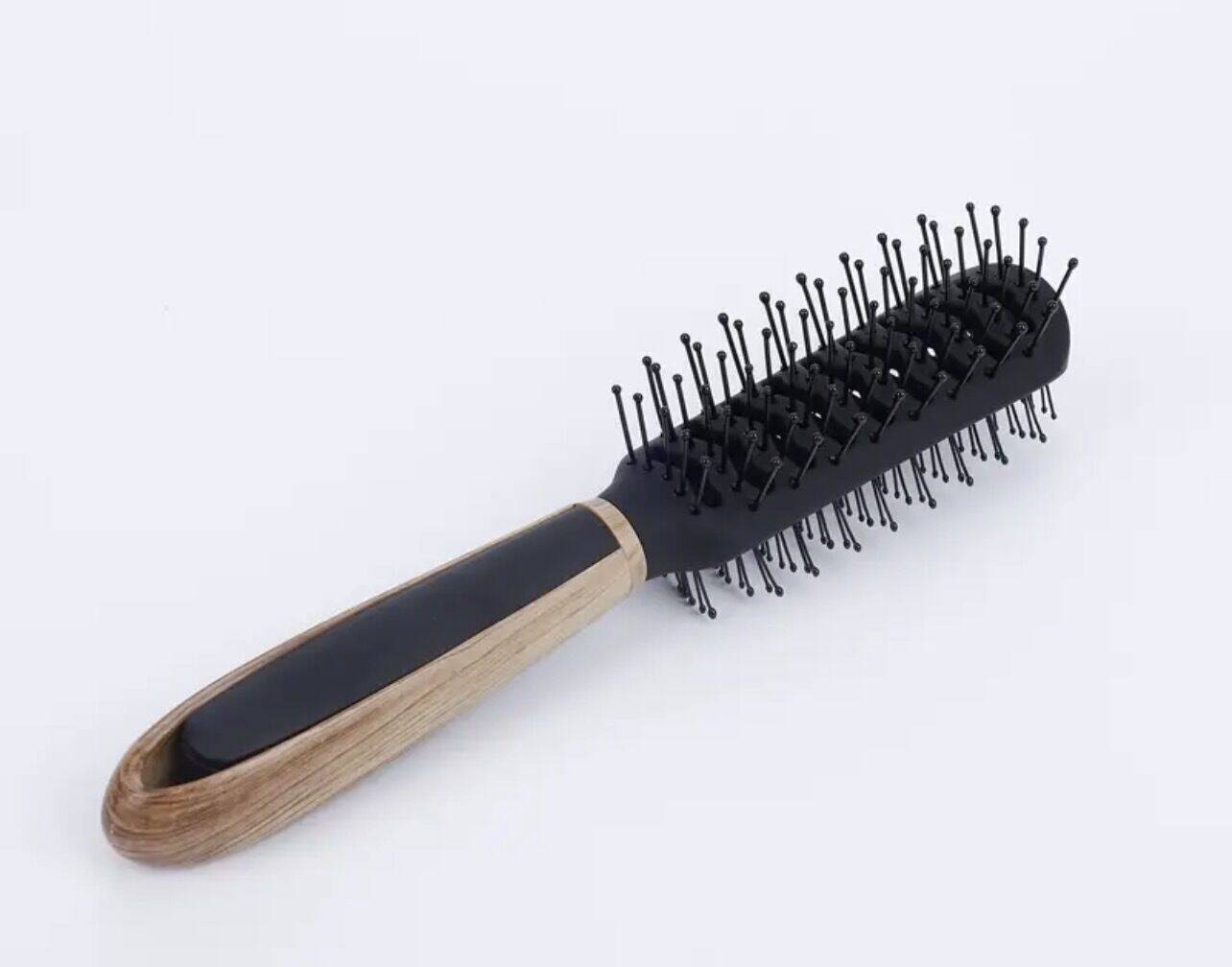 Brosse à cheveux double face 