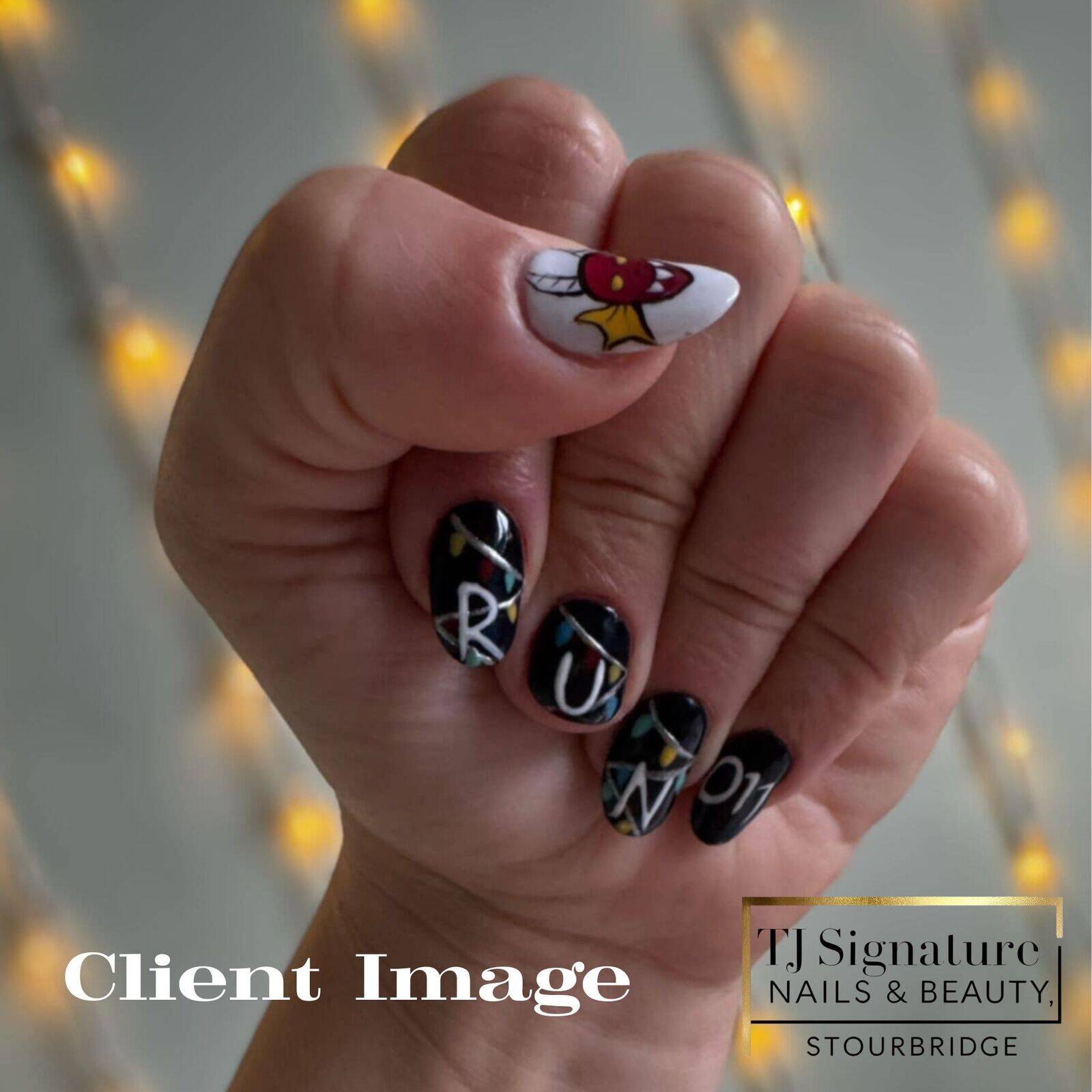 Stranger Things–inspired, fully hand-painted nail art on builder gel. One nail was broken, and the client chose to keep it natural without a tip — the design was still completed seamlessly.