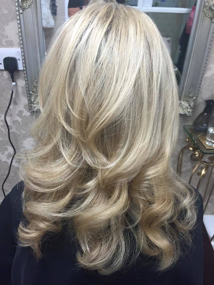 Blonde highlights with a cut & bouncy blow dry 