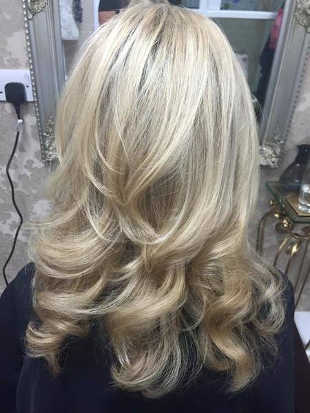 Blonde highlights with a cut & bouncy blow dry 