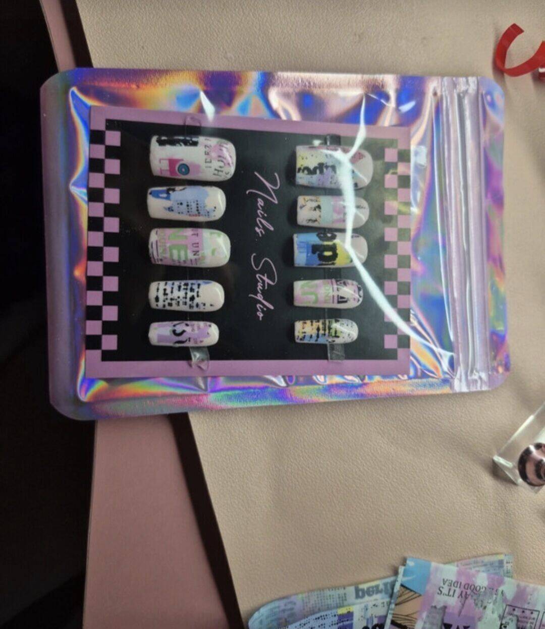 Newspaper press on nails