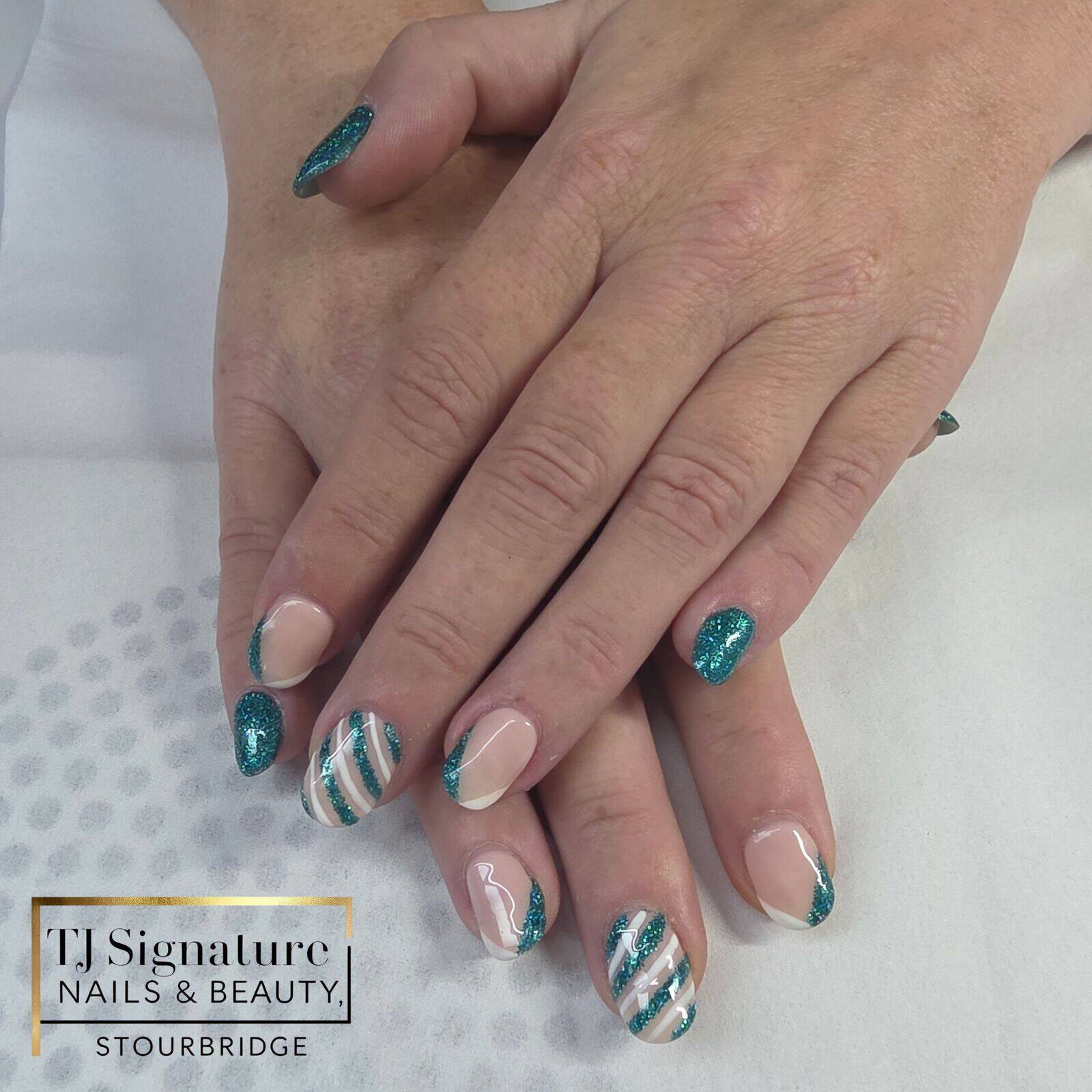 A stunning teal Christmas set featuring glitter accents, soft nudes and festive candy-stripe detailing — a beautifully bold and modern look for the season.