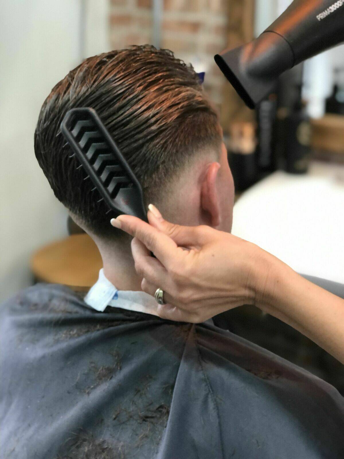 Finishing off and styling an expert cut