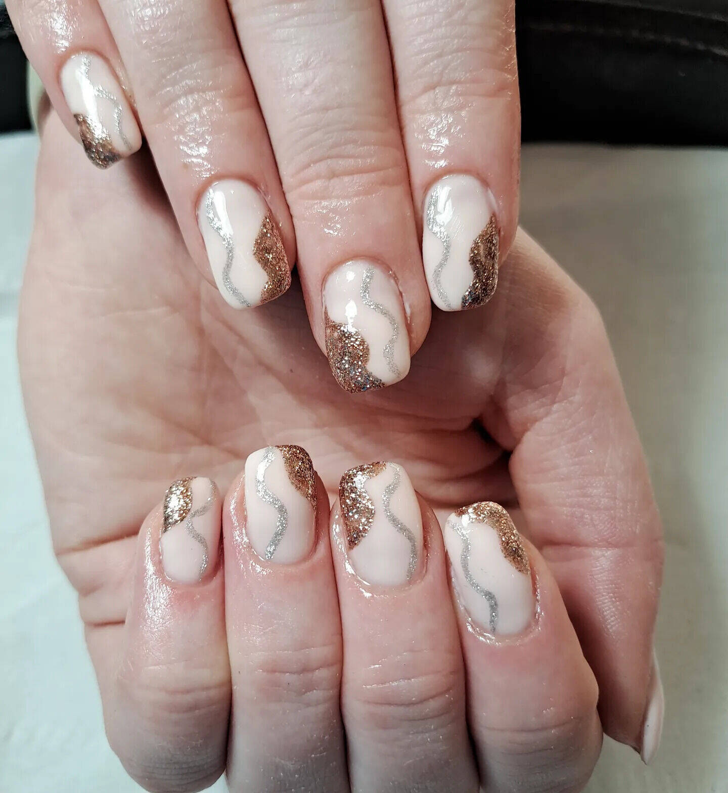 Gel biab on natural nails with abstract (copper and silver) swirls