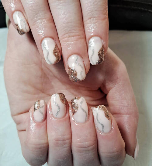 Gel biab on natural nails with abstract (copper and silver) swirls
