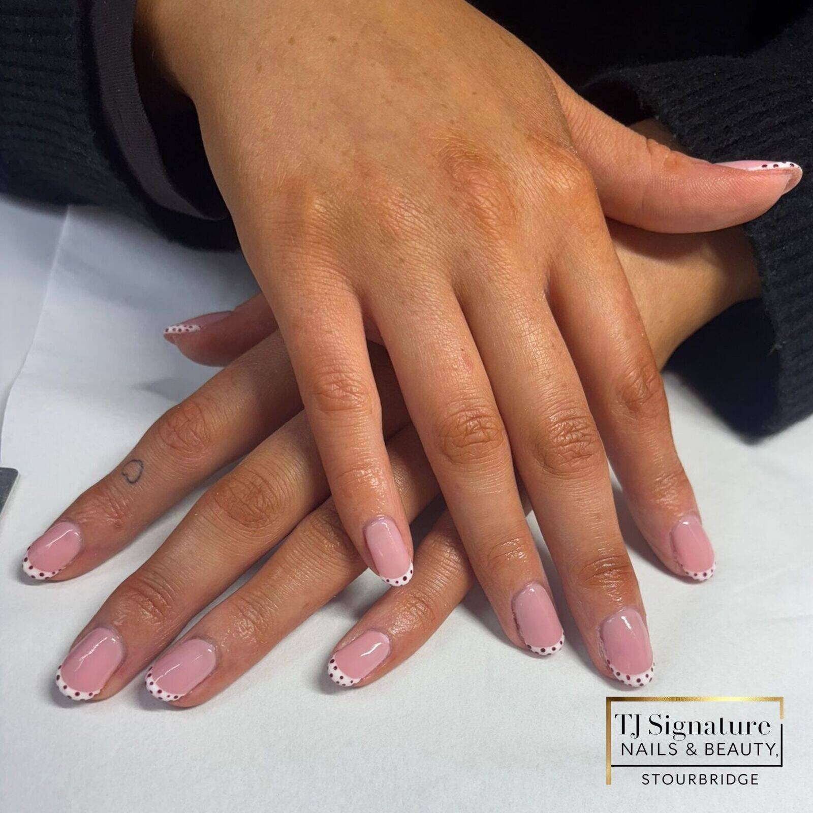 Natural builder gel with a dotted French — simple, strong, and super cute 🤍