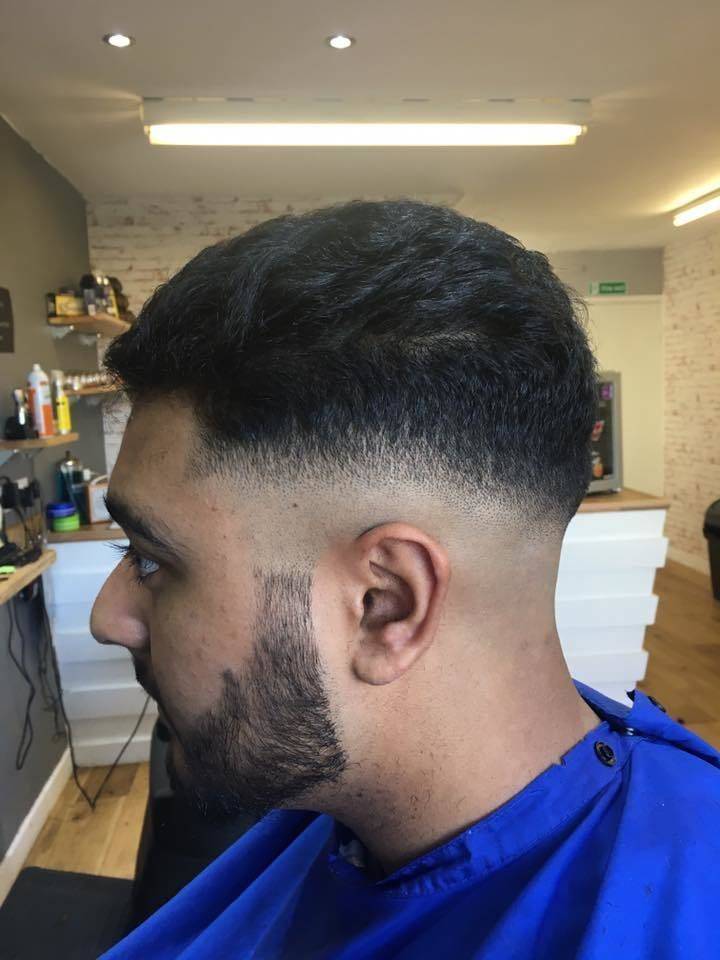 Skin fade slick back hair done by Ryan #ccbarberingco