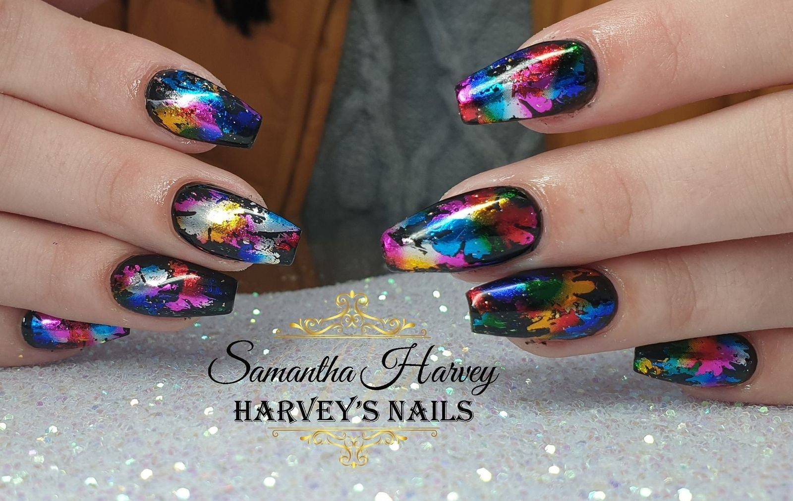 Acrylic extensions, finished with Gel polish and foil design