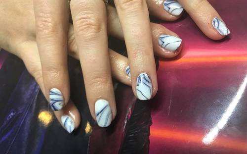 One of our lovely ladies and kelly had fun with the nail printer!!