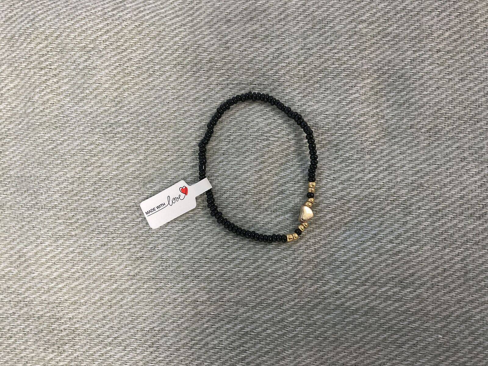 Bracelet noir avec cœur or 