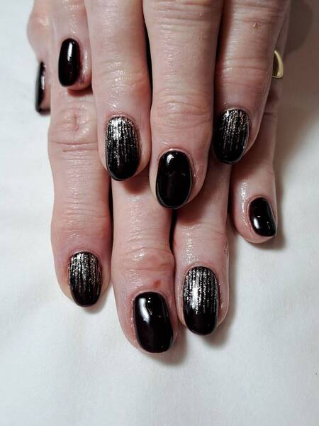 Black gel polish with a glitter rain fall