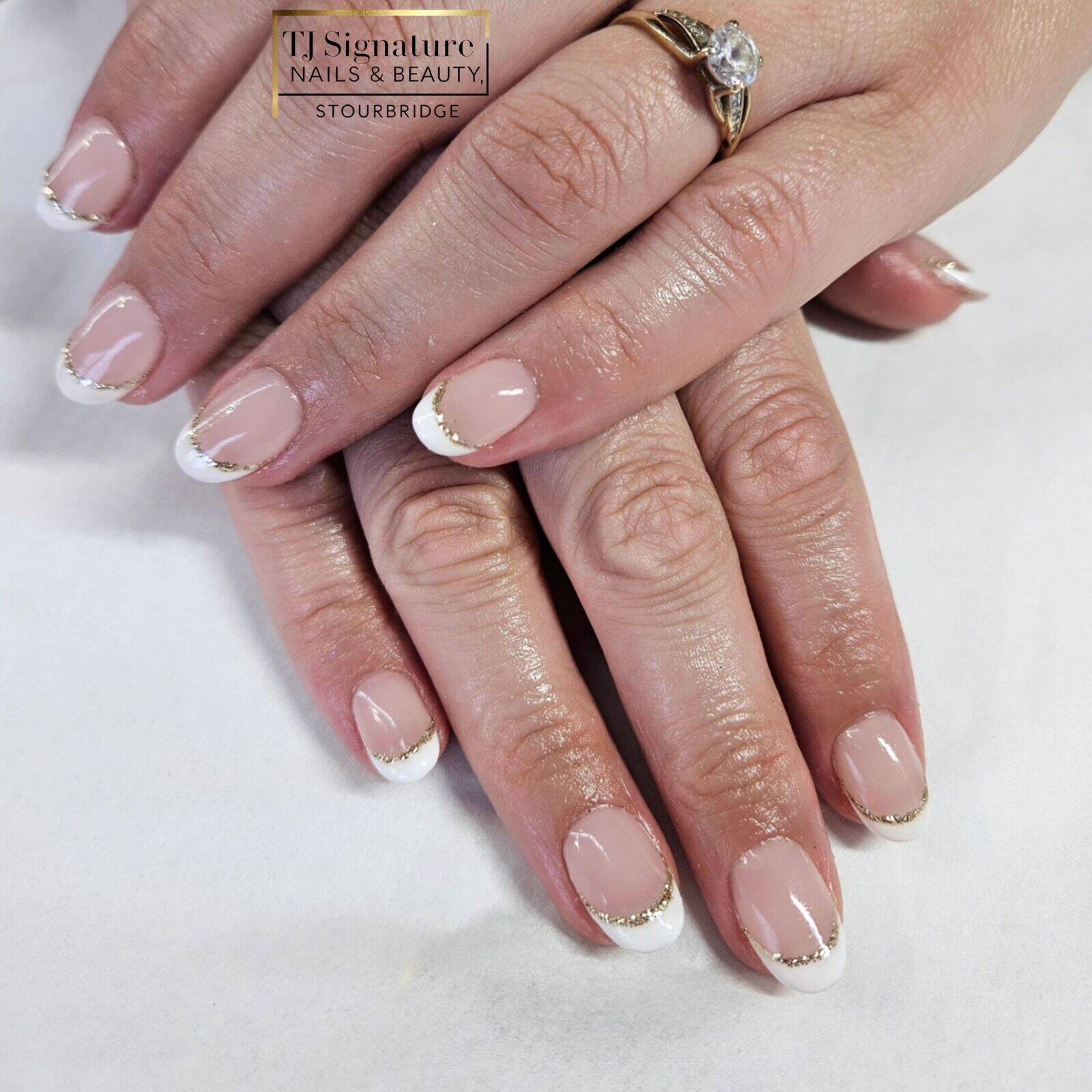 So honored to create this lovely set of gel bonds for a client getting married! She chose a timeless French manicure with a delicate gold glitter outline