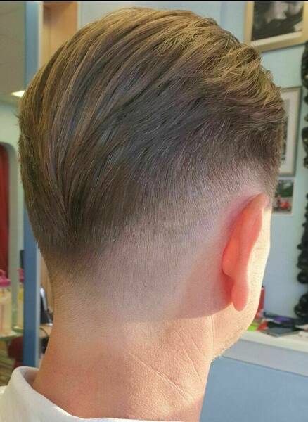 Gentlemanly low fade...classic cut 