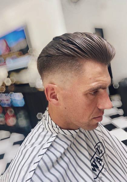 Another from Jake - High, double disconnected skin fade. Going for that Brad Pitt, Fury look😎