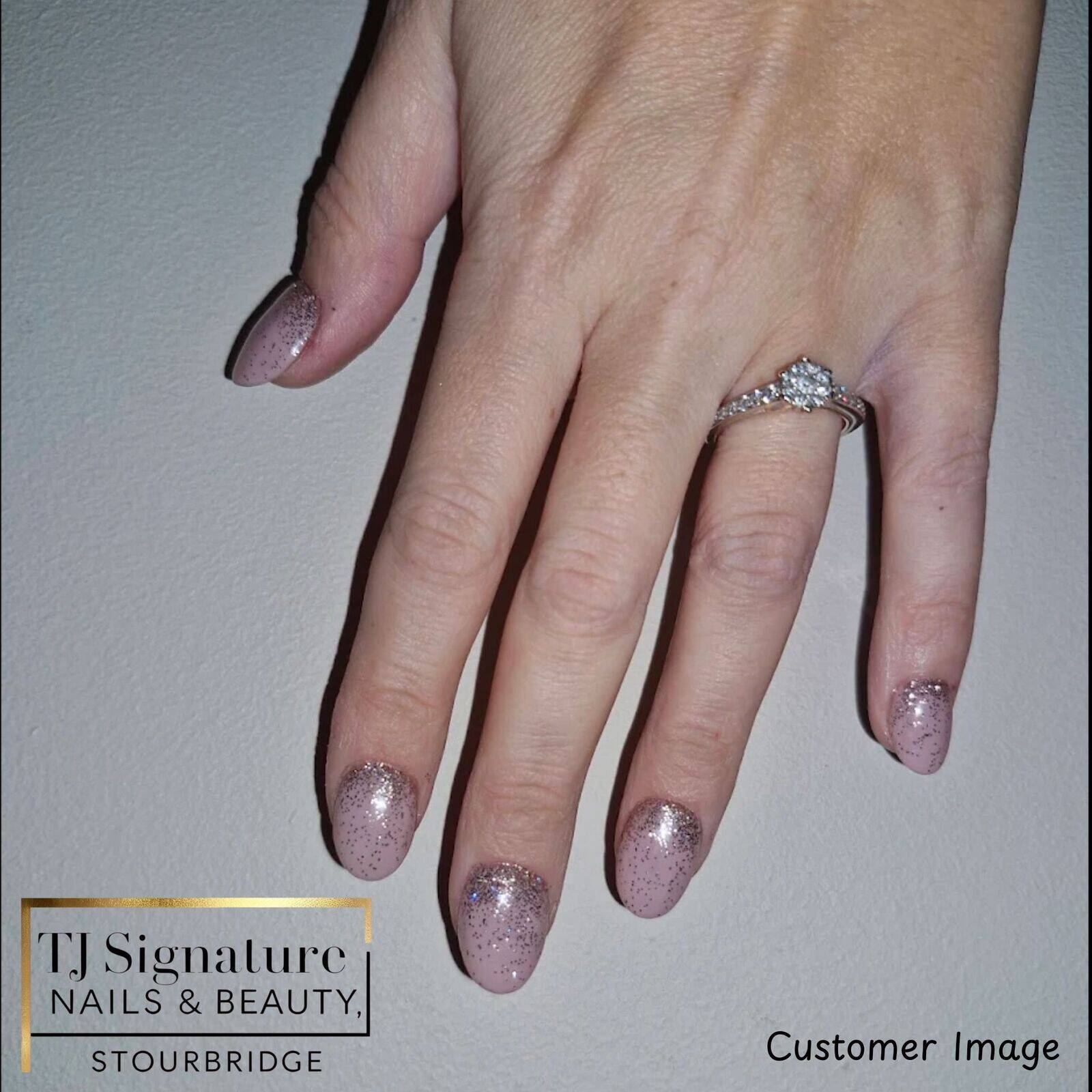 ✨ Glitter Fade Perfection ✨ Beautiful nude acrylics finished with a soft glitter fade – the perfect mix of elegant and sparkly. 💅✨