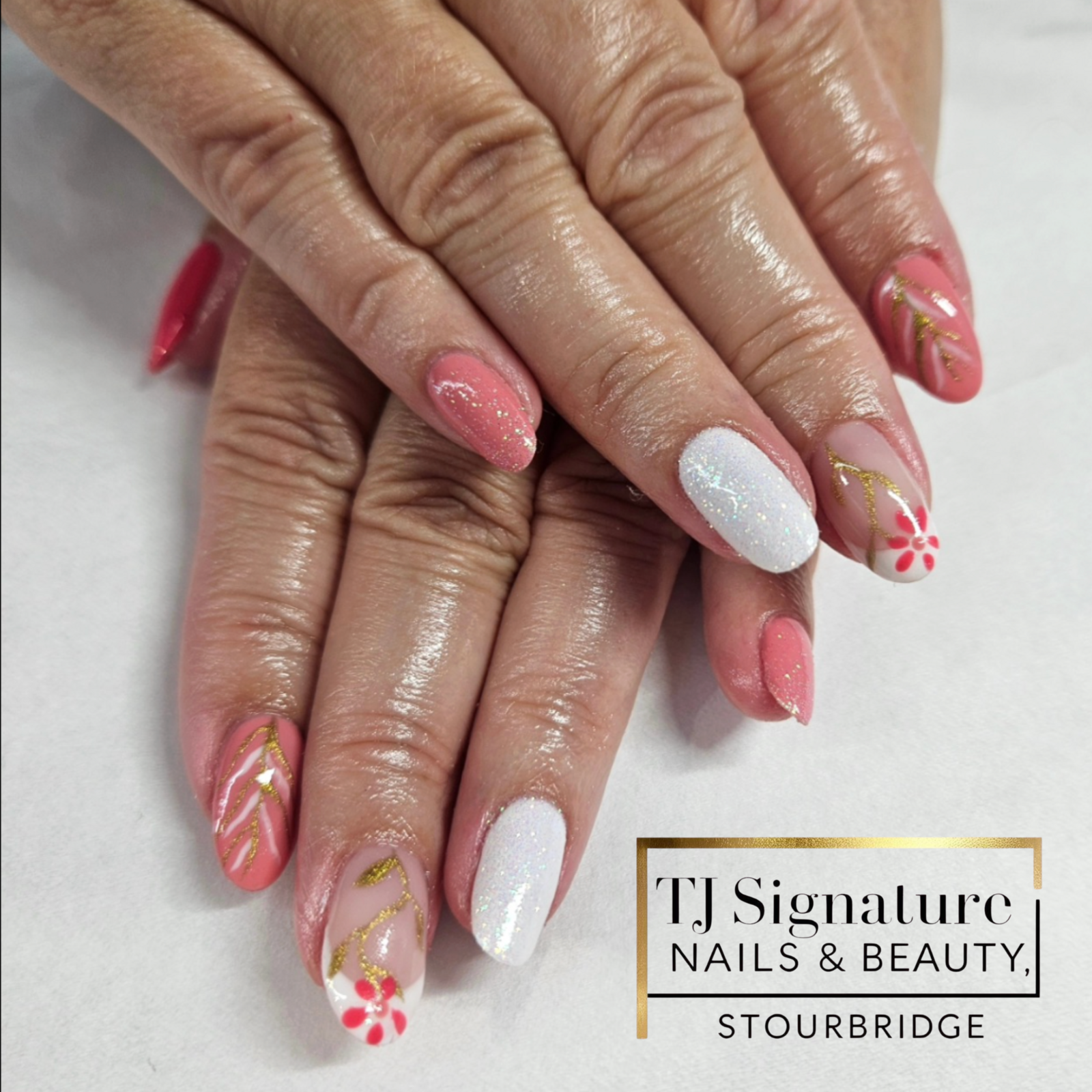 Fresh blooms and glitter sparkle – the perfect nails for spring into summer.