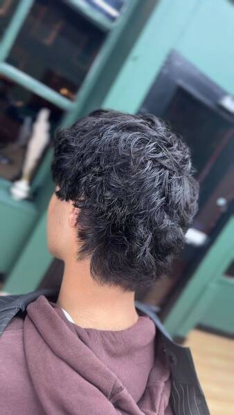 Classic Mod Cut with modern texture — precise shape and clean fringe styled by Riz at RYZN Barbers Musselburgh