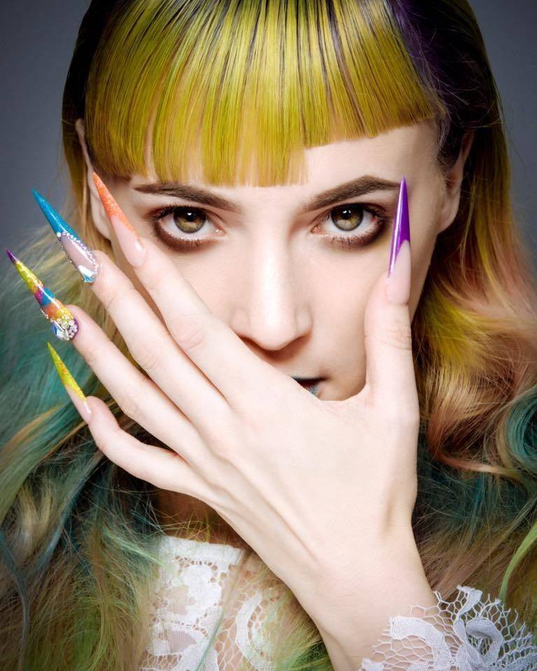 This extreme nail design and photo was created by Sam for a competition to feature on the front cover of 'Scratch' magazine, and has become our feature photo on any things...