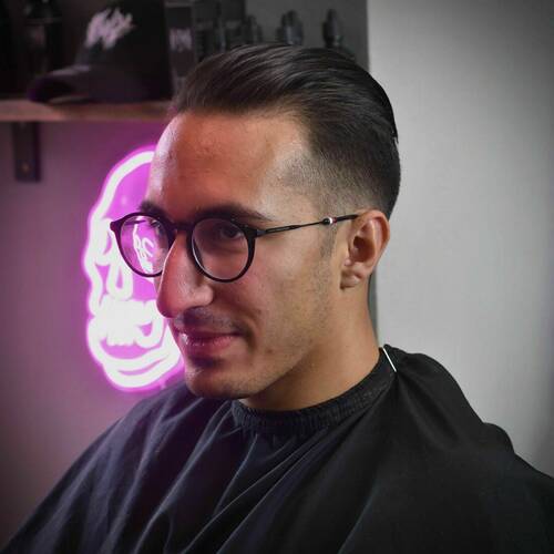Slick back Buxton men’s hair ben