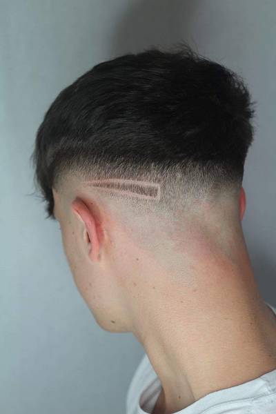 mid/ high fade with Creative design