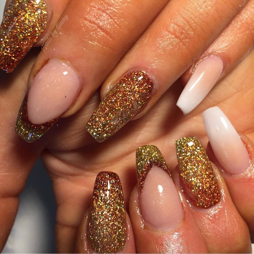 Oh this happened today... out comes the glitter again  but, I have to admit I rather liked them!!! #shiningclaws #nailsaddict #nails #beautytherapist #acrylicnails #nailpro #ombrenails #gold