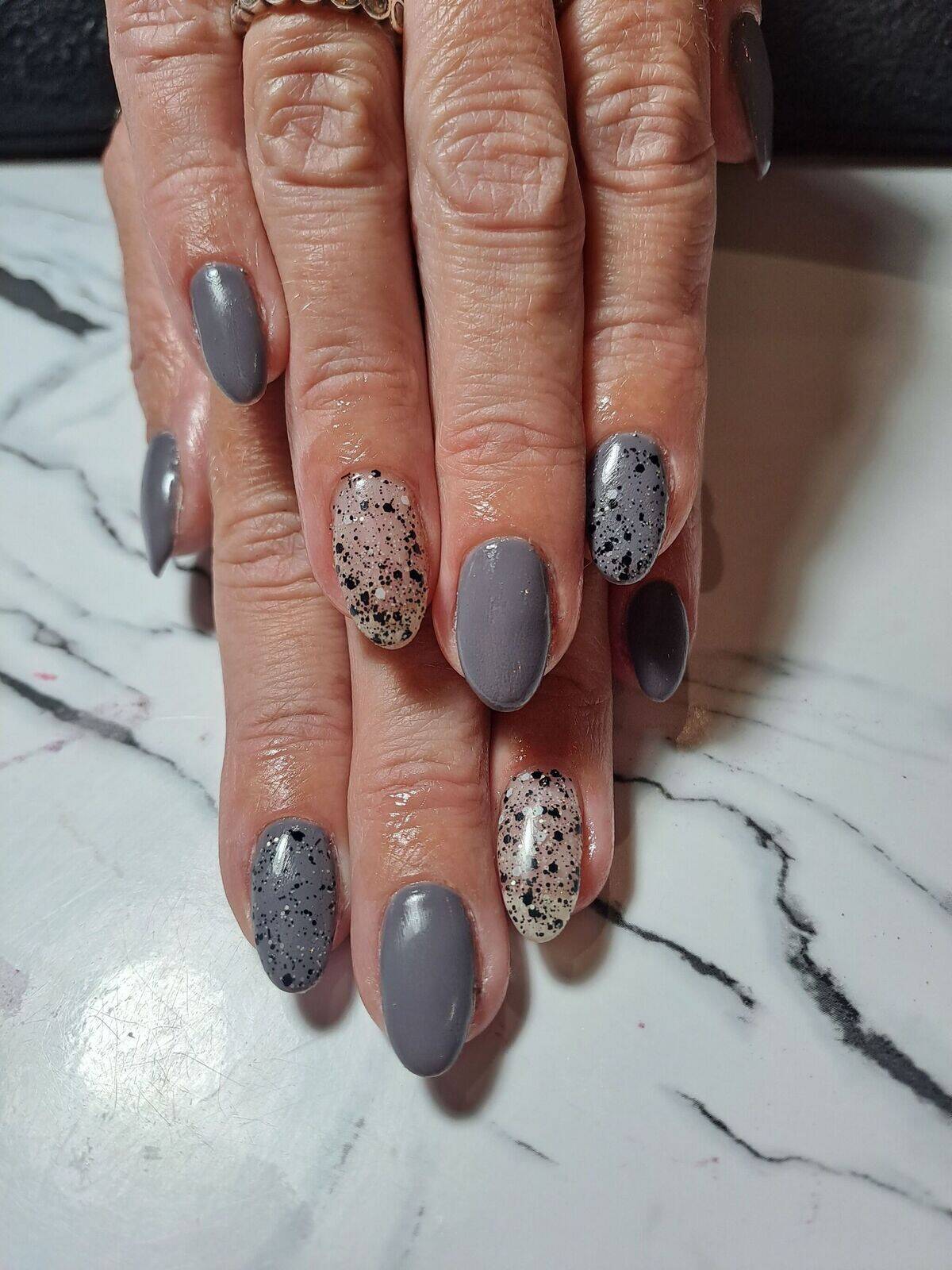 Light grey with a black glitter speckle