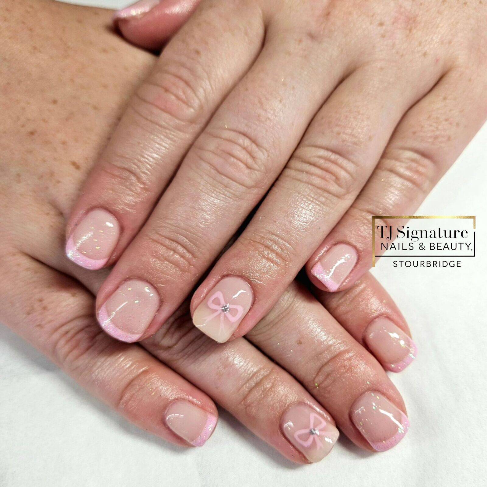 Pretty in pink and bow-tiful! 🎀 Using O.P.I 'Put It In neutral' Gelish 'pink Smoothie' with Blossom glitter