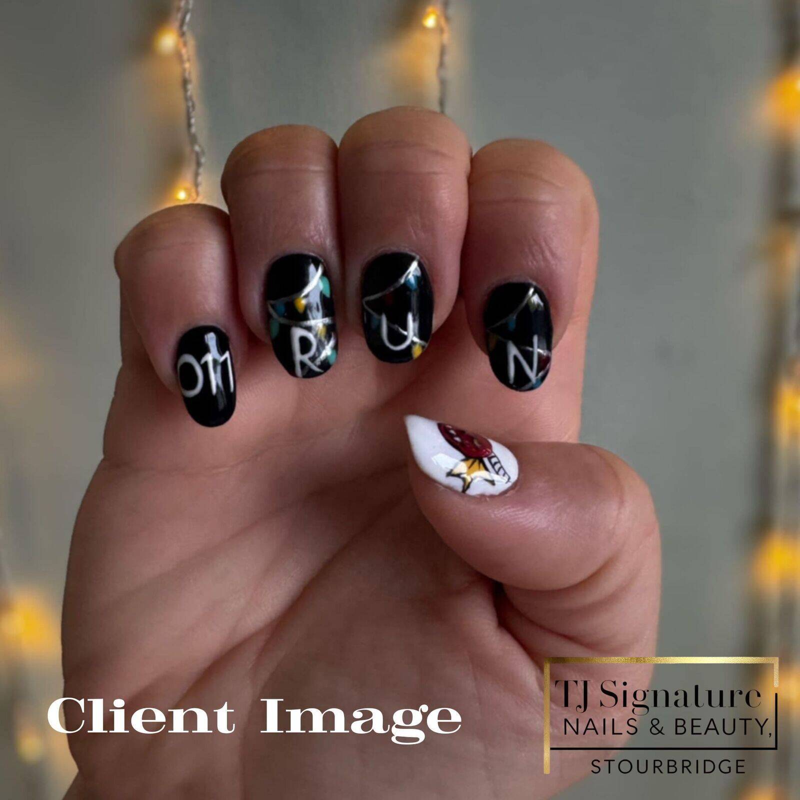 Stranger Things–inspired, fully hand-painted nail art on builder gel. One nail was broken, and the client chose to keep it natural without a tip — the design was still completed seamlessly.