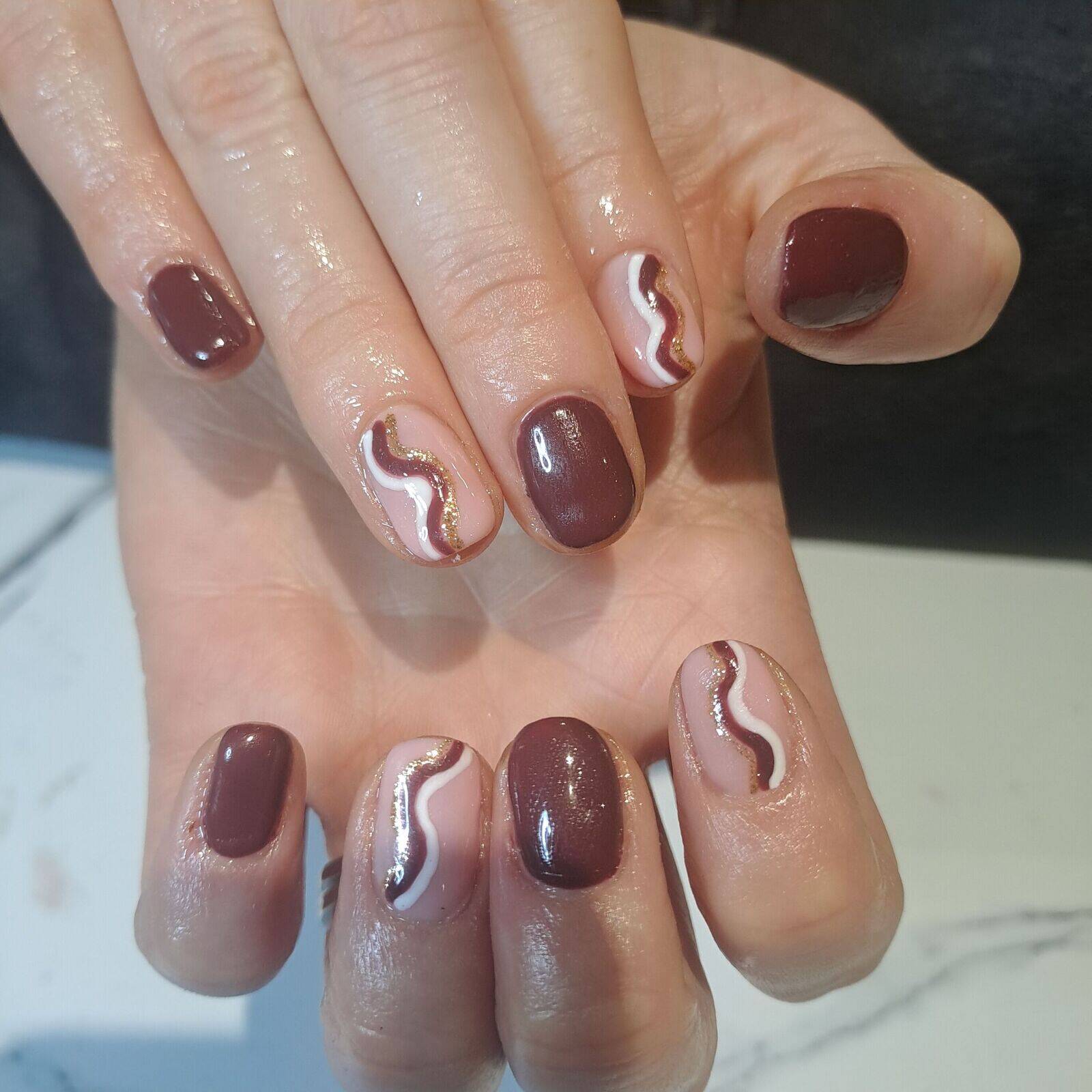 Autumn vibes! chocolate brown, nude biab and some simple swirls