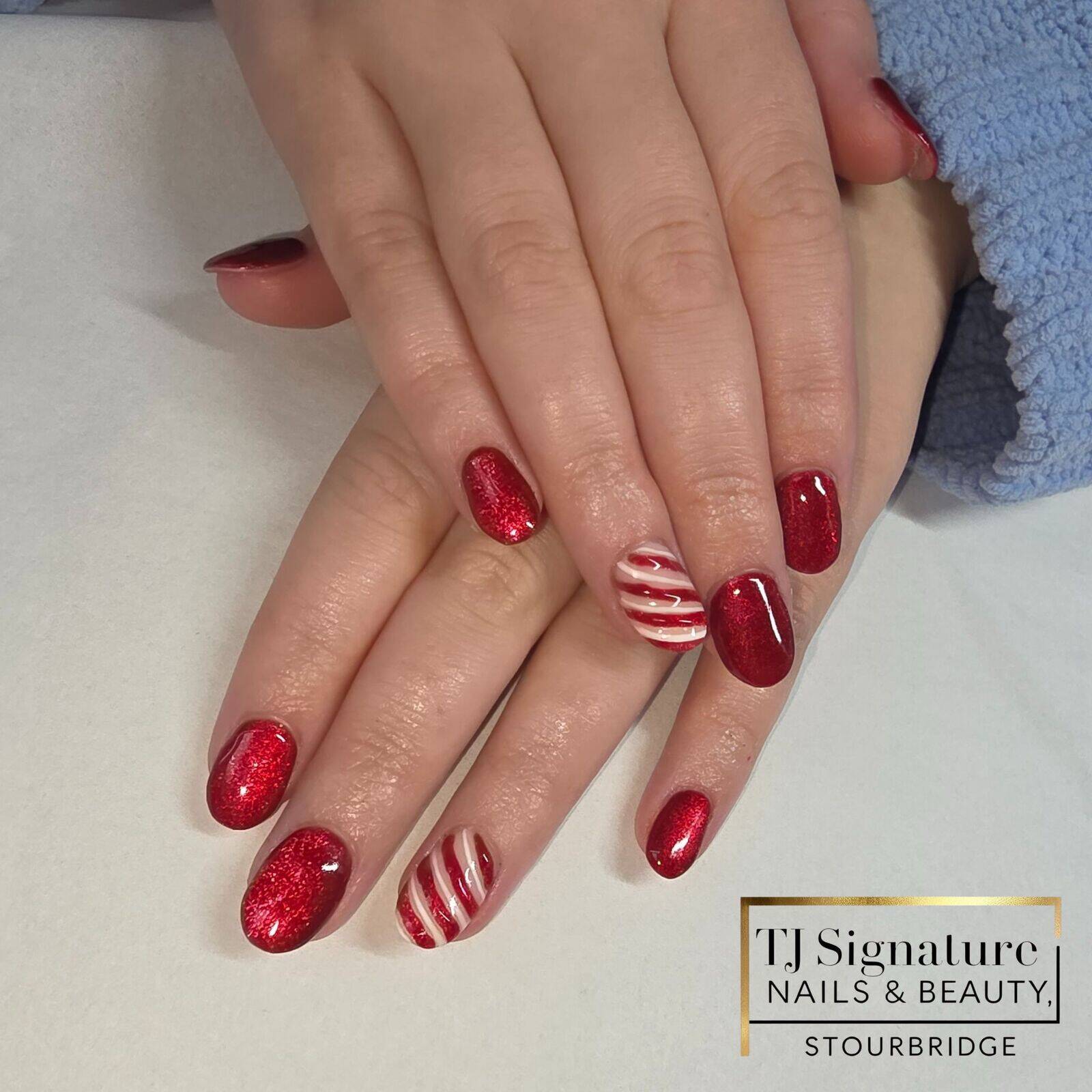 A rich red cat-eye, finished with a candy-cane accent for a subtle festive touch. A popular Christmas shade with a beautifully shimmering finish.
