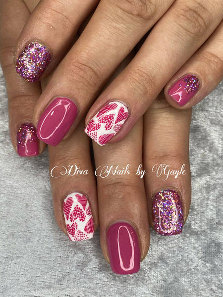 Valentine’s Day inspired glitter and stamping on this pretty pink gel 