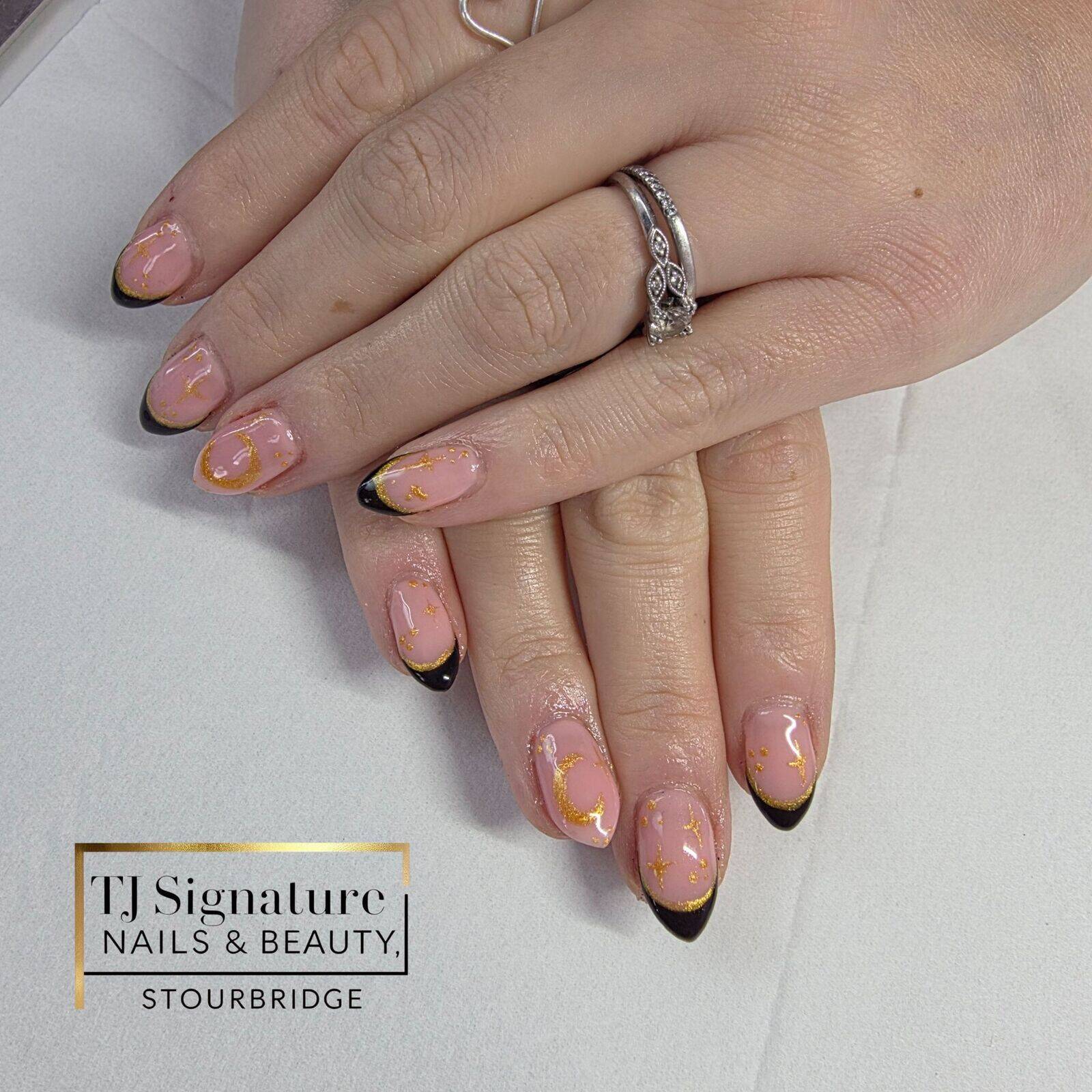 Black & Gold Elegance ✨ A timeless design blending a soft natural base with striking black tips and delicate gold detailing. I maintain the shape my client loves,