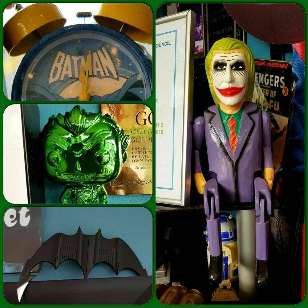 Latest acquisitions to the Barber Shop of Superheroes and Movies…Joker on a shelf, Batman clock,Emerald Joker and Batarang