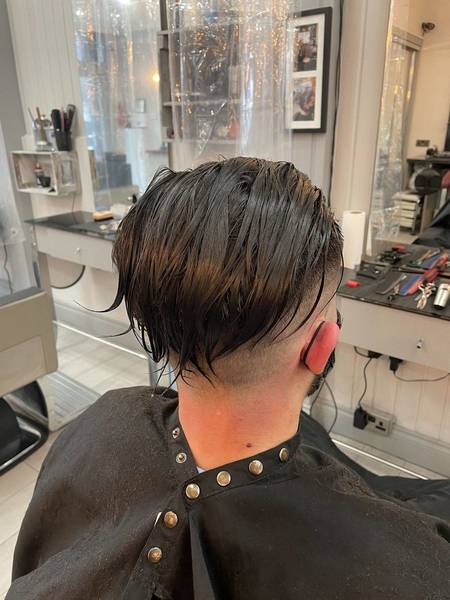 Styling back and sides before addin perm curlers and solution