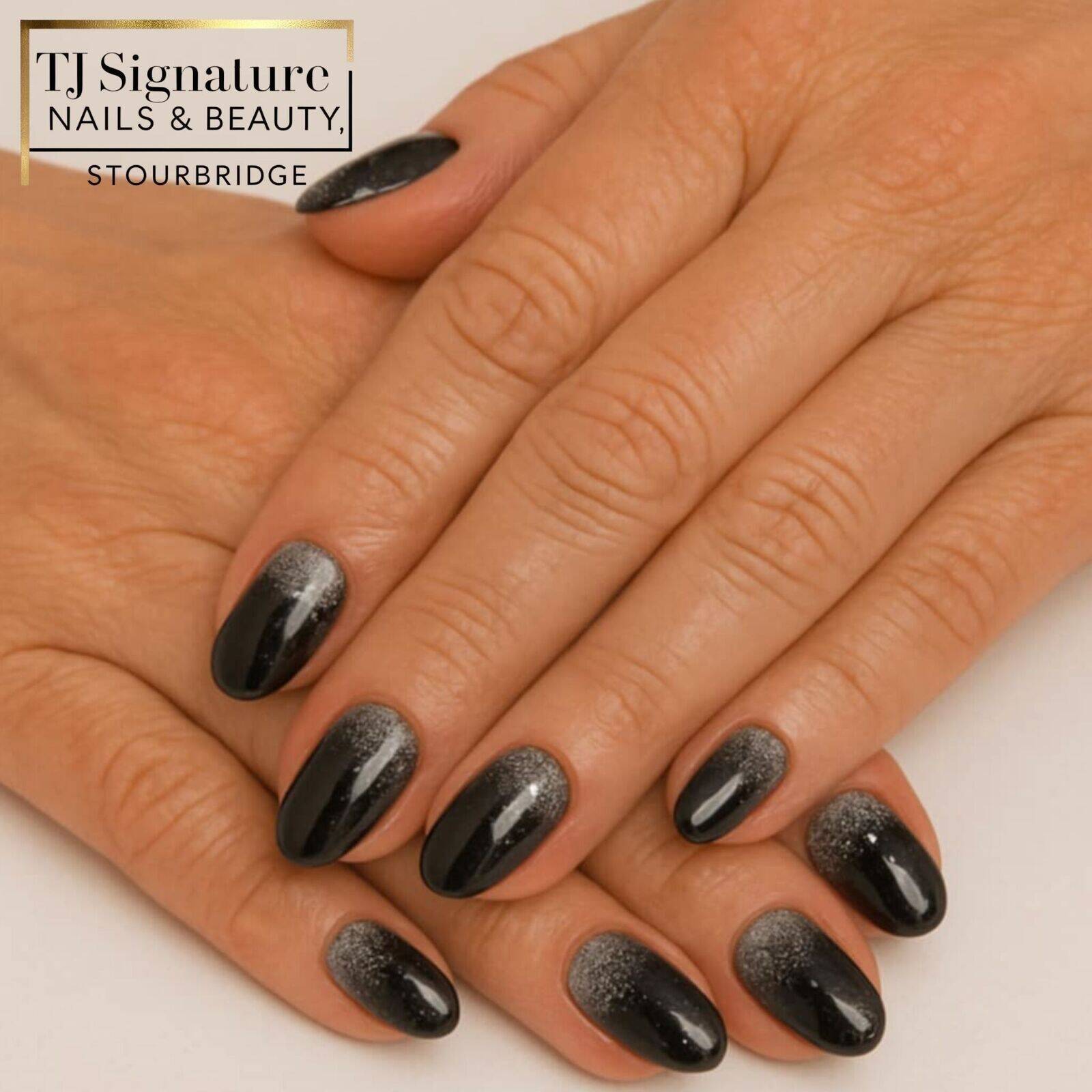 Chic black nails with a silver ombre effect - elegant, bold, and perfect for a stylish look