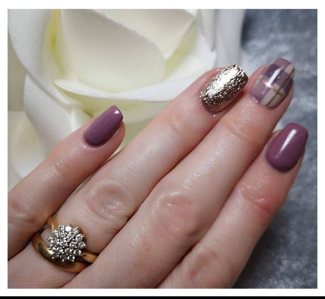 Heather and gold tartan nails