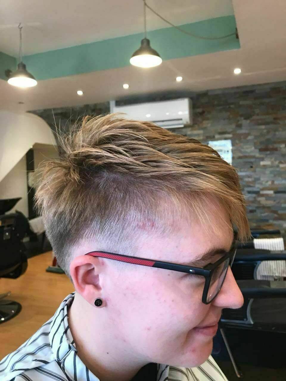Gender neutral short cut. 
