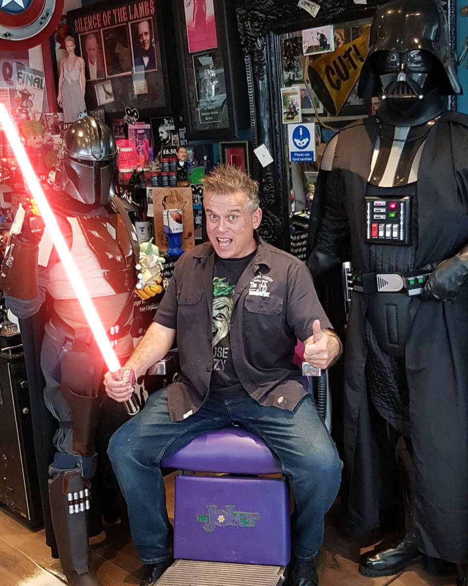 Darth Vader and The Mandalorian pay a surprise visit to The Barber Shop of Superheroes and Movies