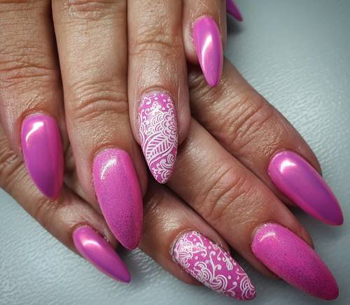 Pretty in pink. Pixie chrome gives a metallic finish that shines orangey-pink. Lovely over warm shades. #chromenails #nailsoftheday #nailextensions #gelnails #pinknails #nailsalon