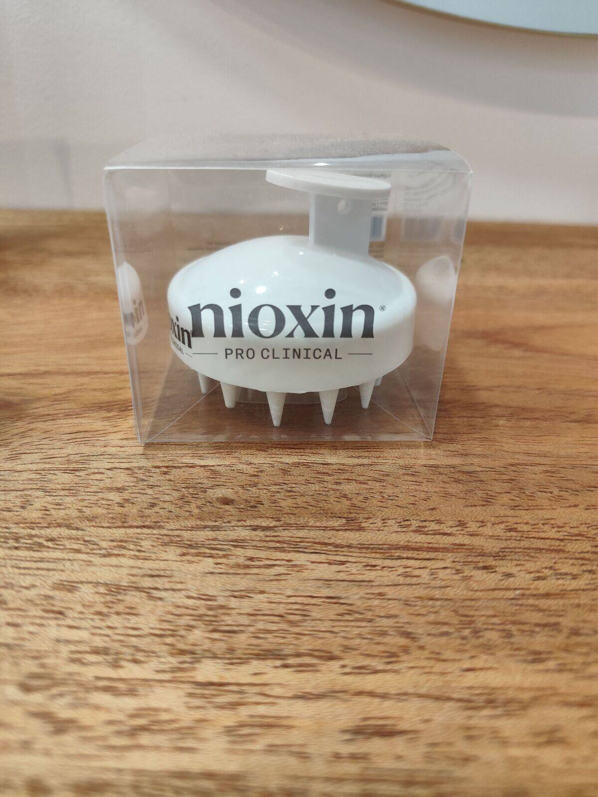Brosse massante, nioxin