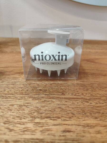 Brosse massante, nioxin
