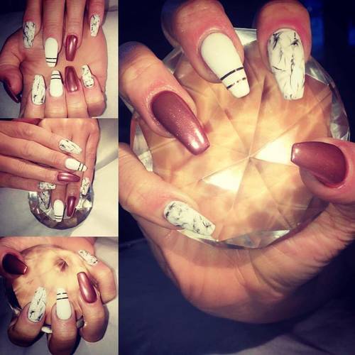 Attempting marbling... with some Rose gold chrome and pretty striping  #acrylicnails #acrylics #ballerinanails #cnd #shellac #rosegold #marblenails #nailsofinstagram #nailsonfleek #instanails